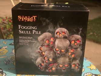 Spirit Halloween FOGGING SKULL PILE (NEW IN BOX)