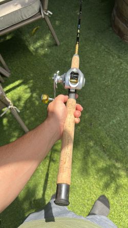 Left handed Bait casting fishing reel and rod