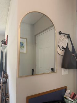 Gold arched mirror