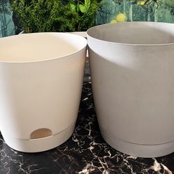 Two Nice Planter Pots.   Left is 10” Diameter x 8.6” H and Right is 9.75” Diameter x 9.75” H. 